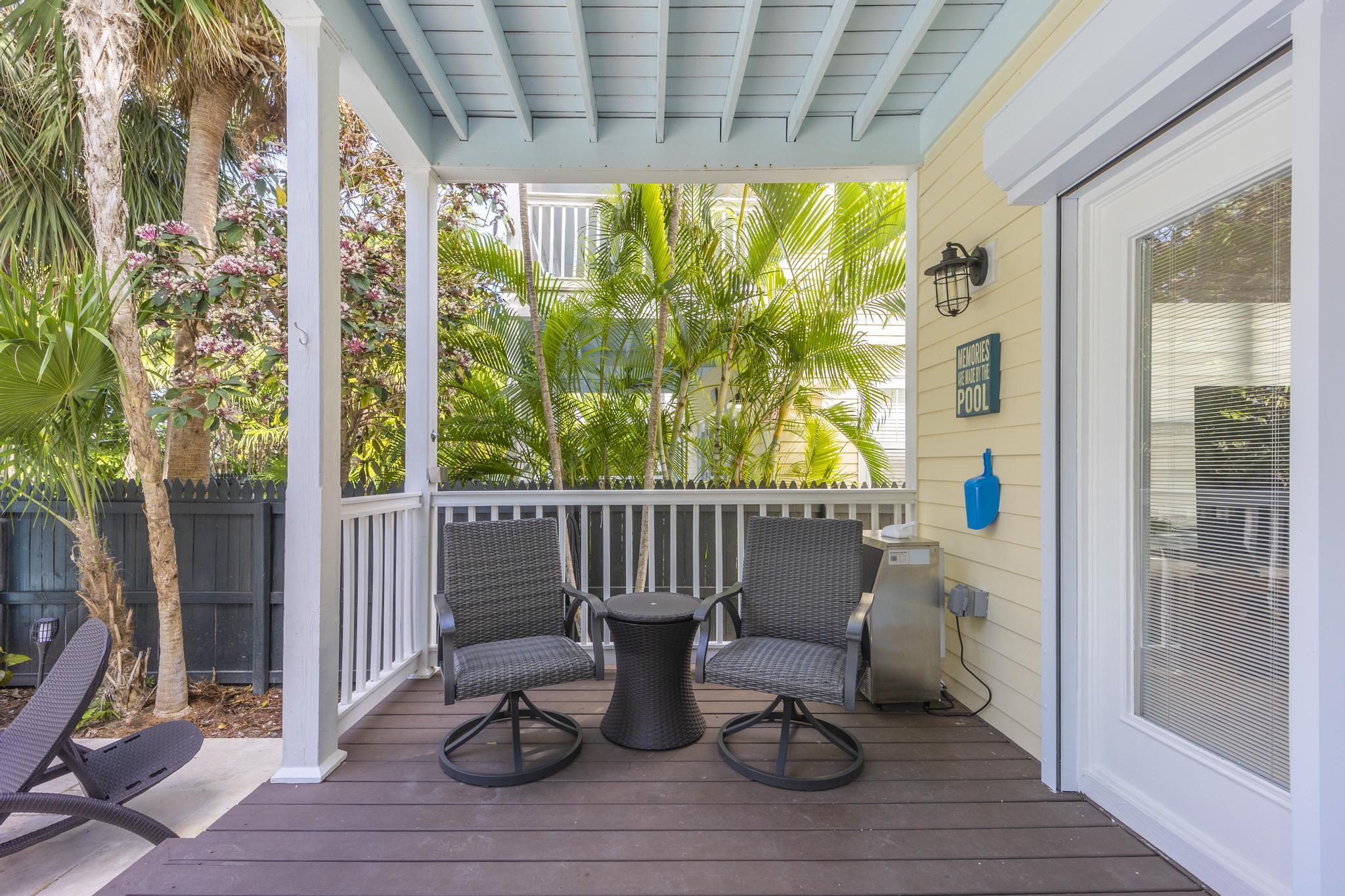 7213 Simran Lane Marathon, FL 33050 - Photo 15 of 40 a view of balcony with two chairs and a table