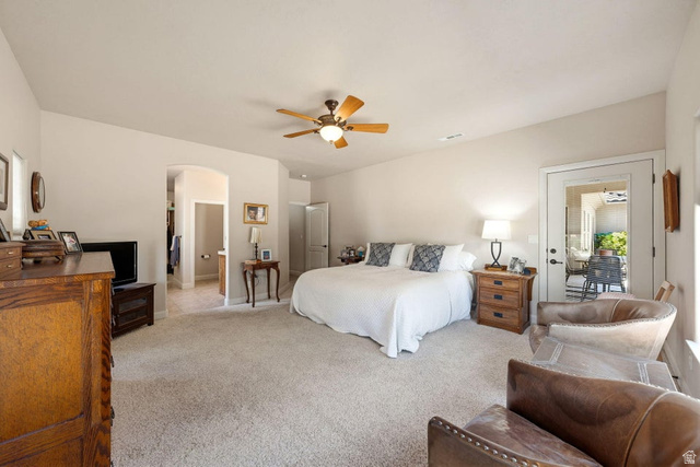 1609 East 10 S Street St. George, UT 84790 - Photo 28 of 68 Carpeted bedroom with a ceiling fan, recessed lighting, and an arched doorway
