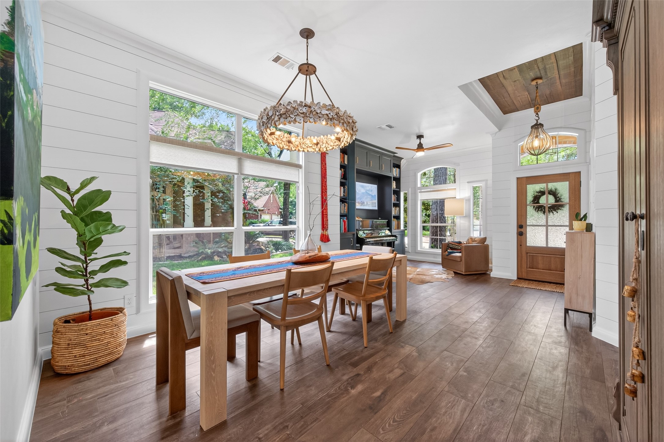 10 Belcarra Place Spring, TX 77382 - Photo 12 of 49 ruly stunning, full renovation. Professional design & immaculate attention to EVERY detail. Entry way is gorgeous with wood detail ceiling. High-end, statement lighting for a WOW factor as soon as you enter.