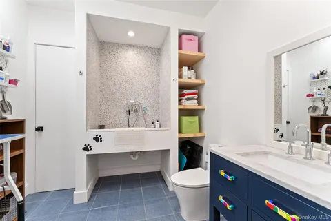 a very nice looking bedroom with a large window