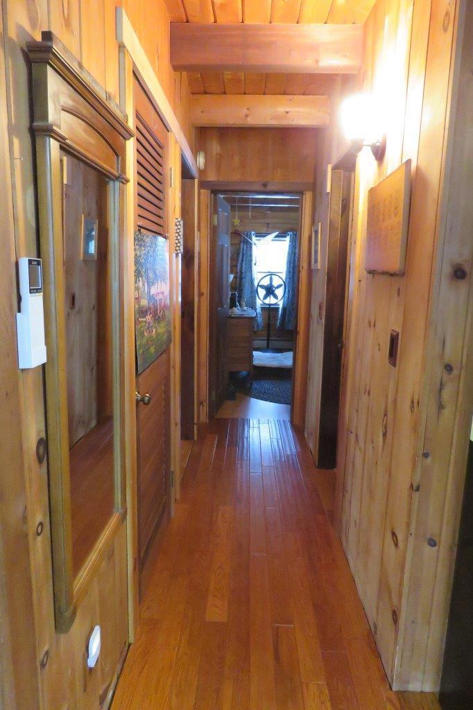 16 Jones Road Harrison, ME 04040 - Photo 8 of 13 Hallway from kitchen to Master