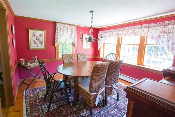 347 North Road Sudbury, MA 01776 - Photo 11 of 27 a view of a dining room with furniture and a window