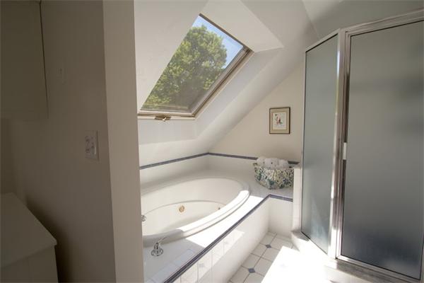 347 North Road Sudbury, MA 01776 - Photo 16 of 27 a bathroom with a tub and shower