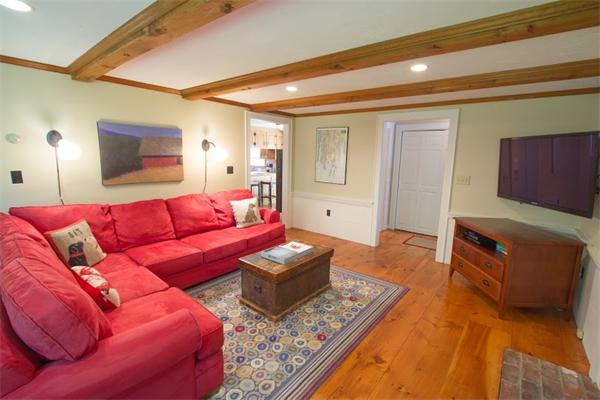 347 North Road Sudbury, MA 01776 - Photo 4 of 27 a living room with furniture and a flat screen tv