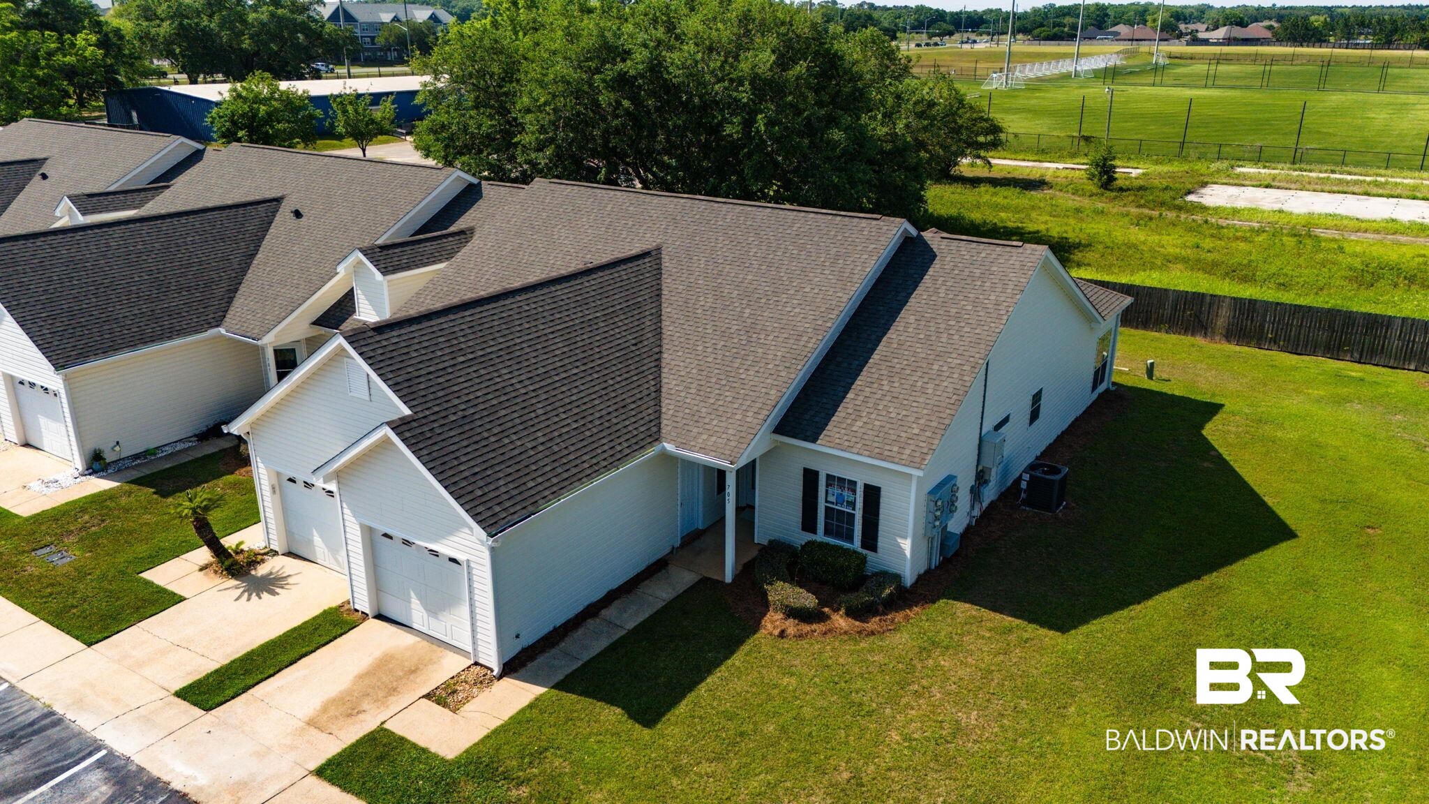 2651 South Juniper Street, Unit 705 Foley, AL 36535 - Photo 30 of 37 Single-story residence featuring white siding and a dark shingle roof