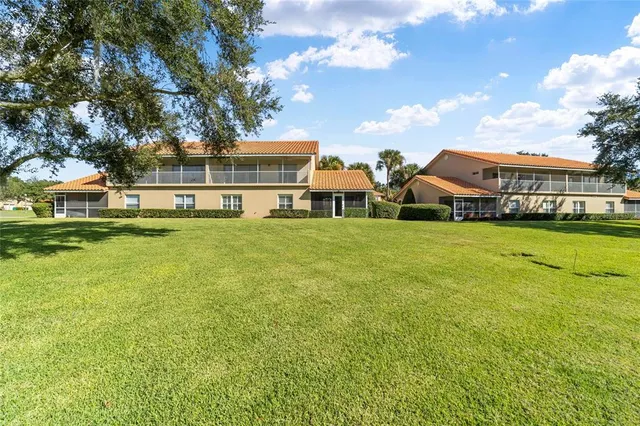 an aerial view of a house with a garden