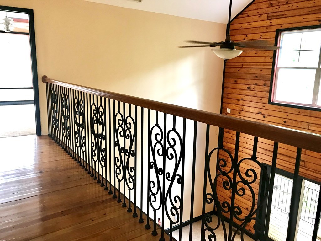 415 Mayfield Road Forsyth, GA 31029 - Photo 8 of 23 a view of balcony with wooden floor