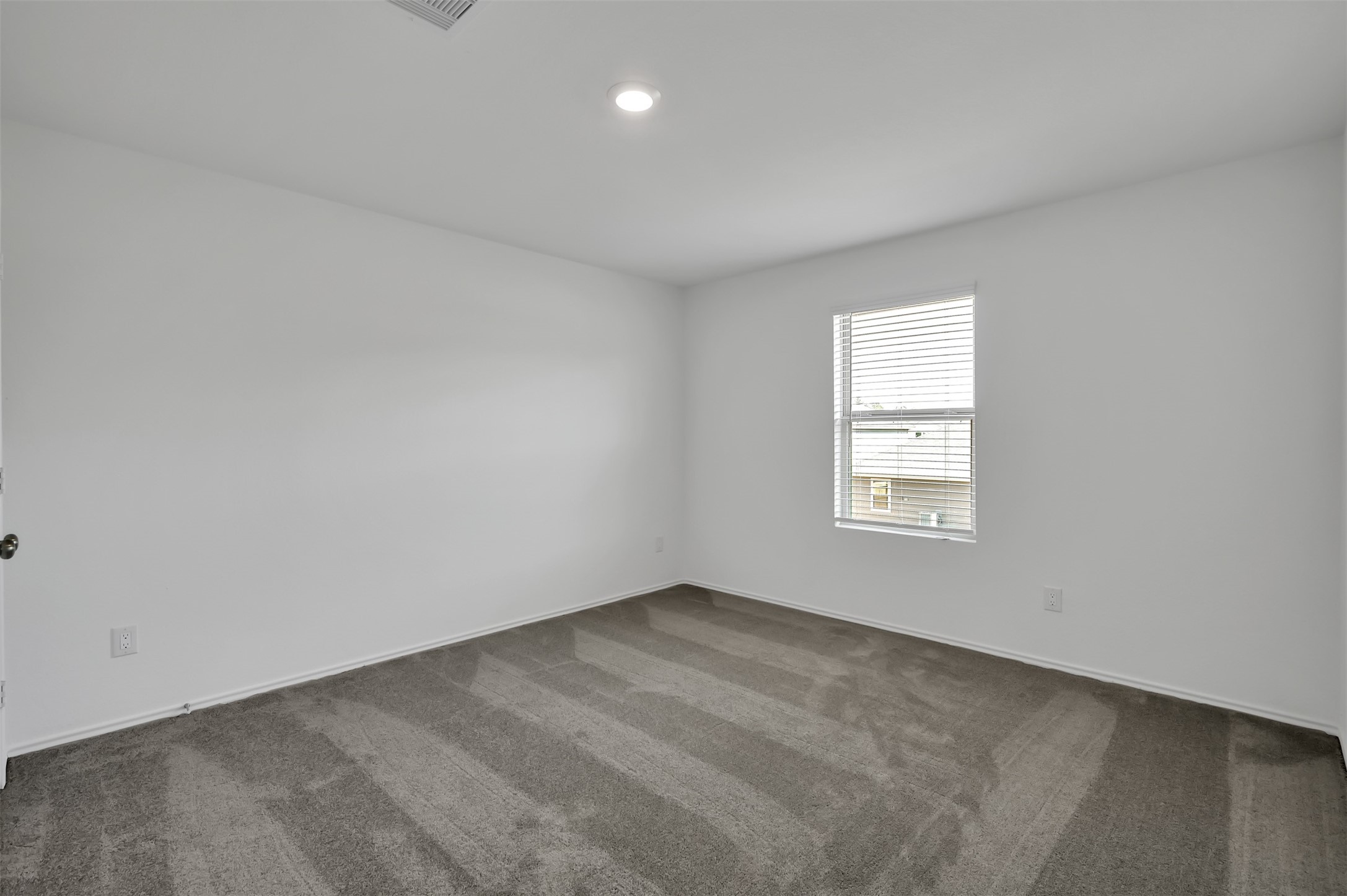 3647 Solanum Drive Conroe, TX 77301 - Photo 13 of 17 an empty room with a window