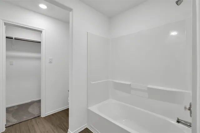 a bathroom with a bathtub