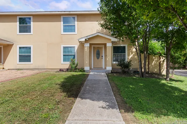 a front view of house with yard