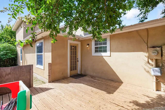 a backyard of a house with seating space