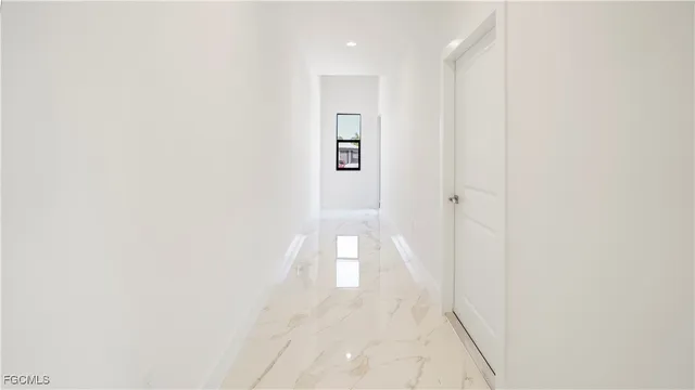 a kitchen with a sink stove and microwave