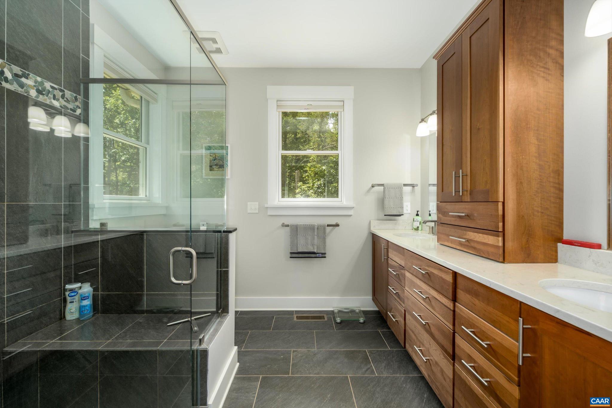 336 Bear Run Road Stanardsville, VA 22973 - Photo 37 of 67 a bathroom with a sink double vanity and a mirror