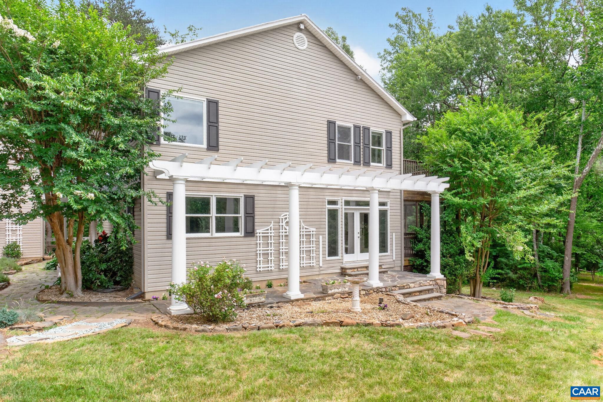 6285 Jarmans Gap Road Crozet, VA 22932 - Photo 56 of 65 a view of a house with yard and sitting area