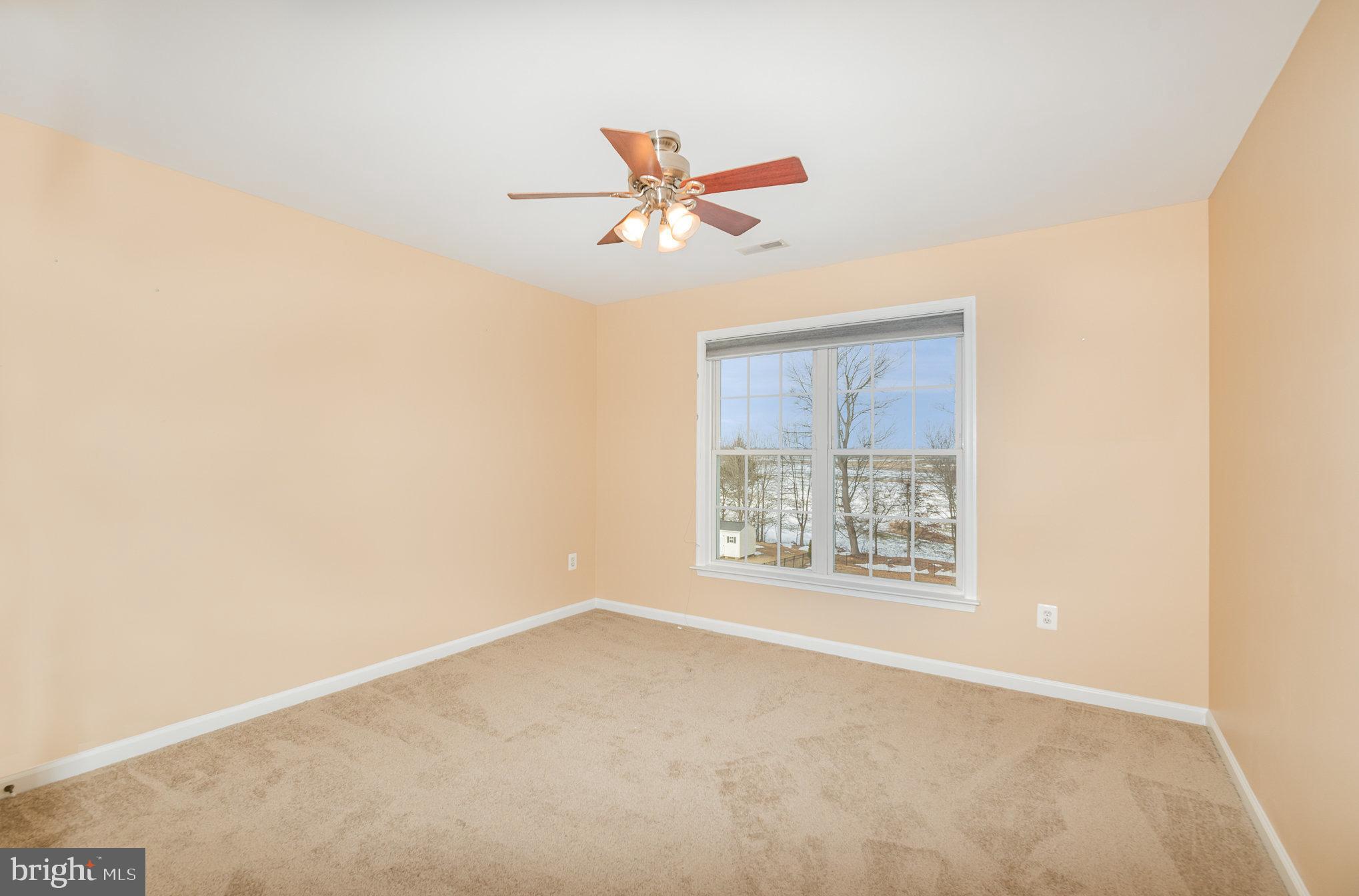 3 Ailsa Court Rising Sun, MD 21911 - Photo 25 of 48 an empty room with windows and fan