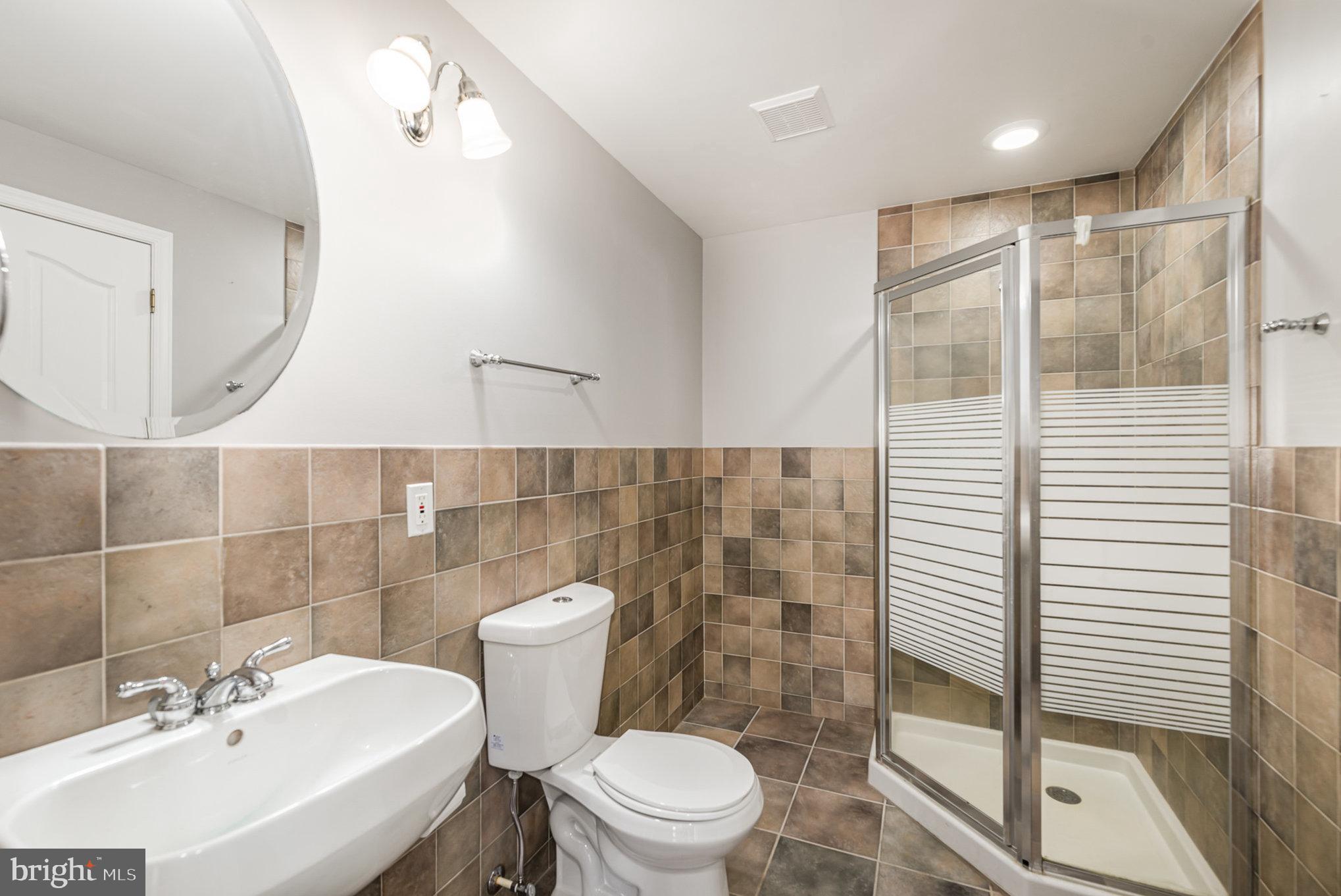 3 Ailsa Court Rising Sun, MD 21911 - Photo 33 of 48 a bathroom with a sink a toilet and shower