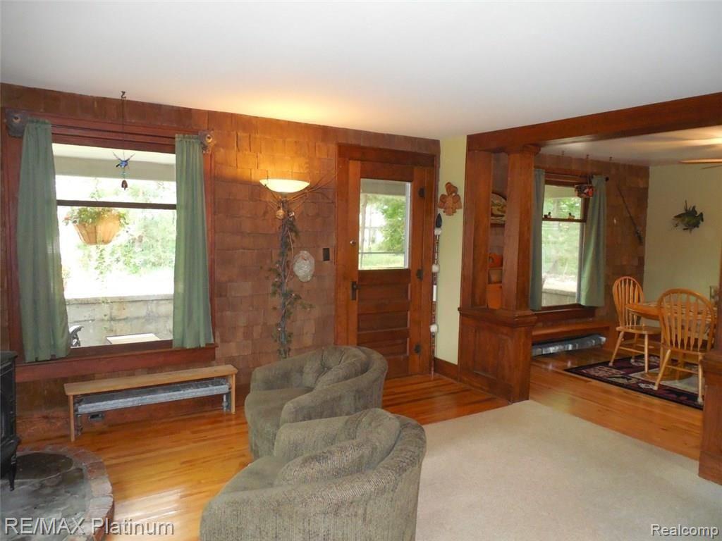 6201 Dutcher Road Howell, MI 48843 - Photo 6 of 22 Front sitting area
