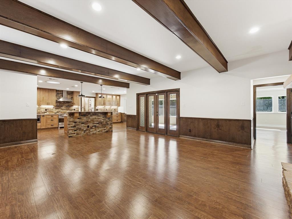 3717 Myrtle Springs Road Benbrook, TX 76116 - Photo 8 of 40 As you enter, step into the great room featuring expansive floorspace, and chunky overhead beams.