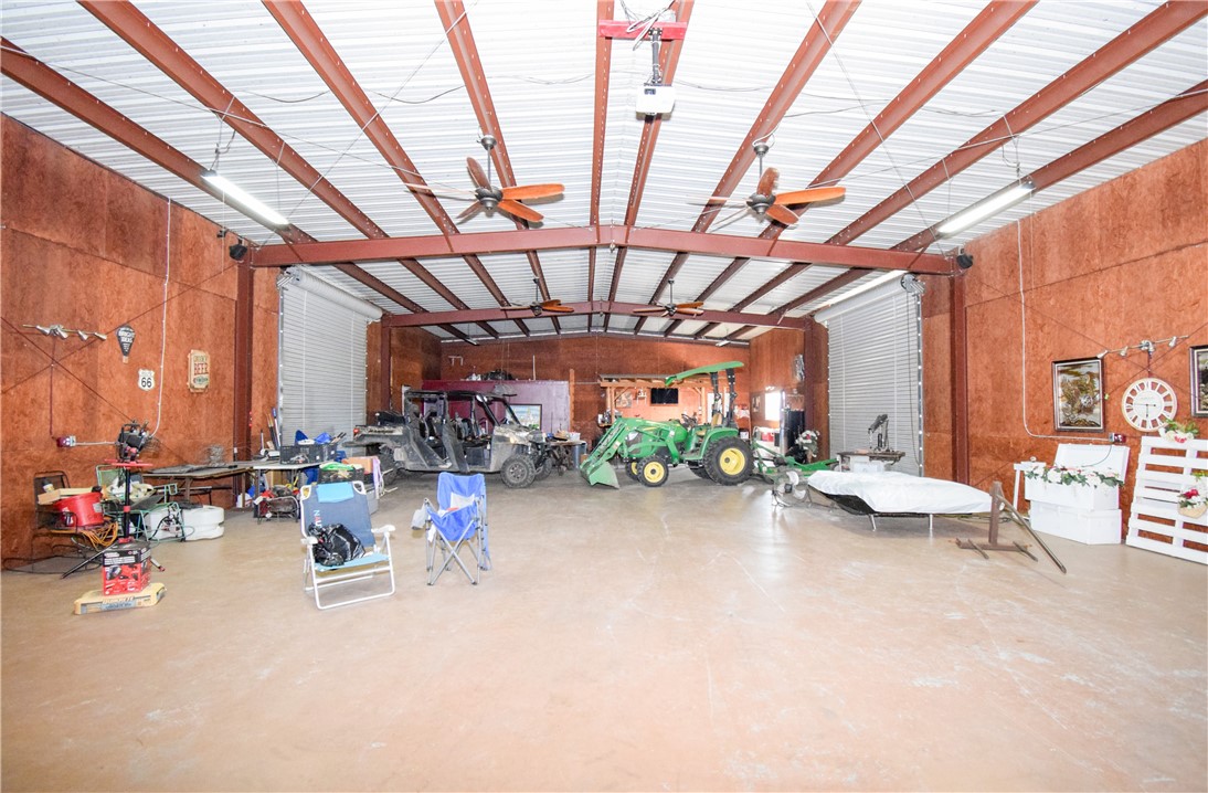23250 County Road 1038 Mathis, TX 78368 - Photo 18 of 40 a view of the patio with dining table and chairs with plants
