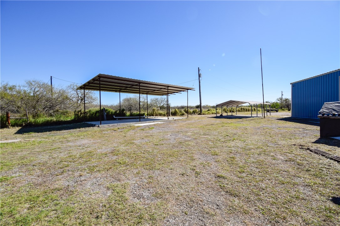 23250 County Road 1038 Mathis, TX 78368 - Photo 24 of 40 a view of a house with a yard