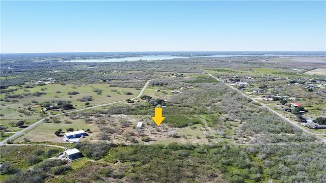 a view of a backyard of a house