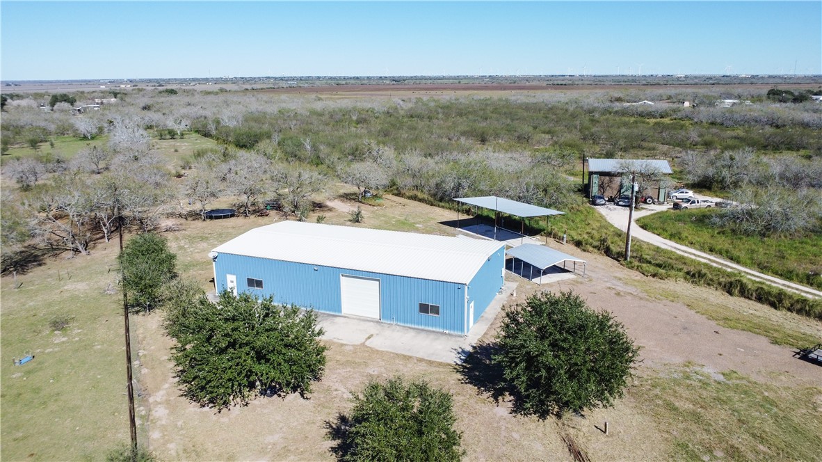 23250 County Road 1038 Mathis, TX 78368 - Photo 37 of 40 an aerial view of a house with a yard