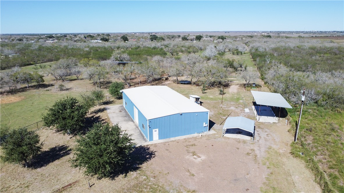 23250 County Road 1038 Mathis, TX 78368 - Photo 38 of 40 an aerial view of a house with a yard