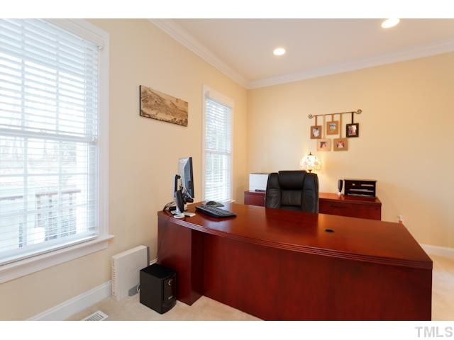 7613 Double E Court Raleigh, NC 27613 - Photo 10 of 23 a view of a workspace with furniture and a window