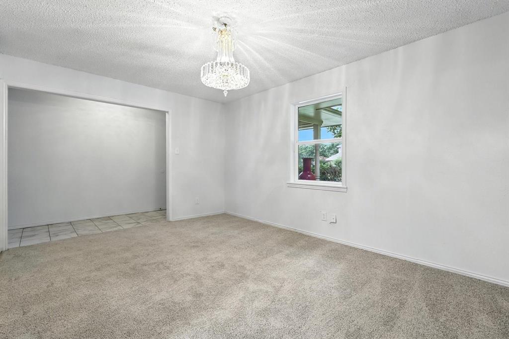 3300 Dunes Street Denton, TX 76209 - Photo 11 of 40 an empty room with a window