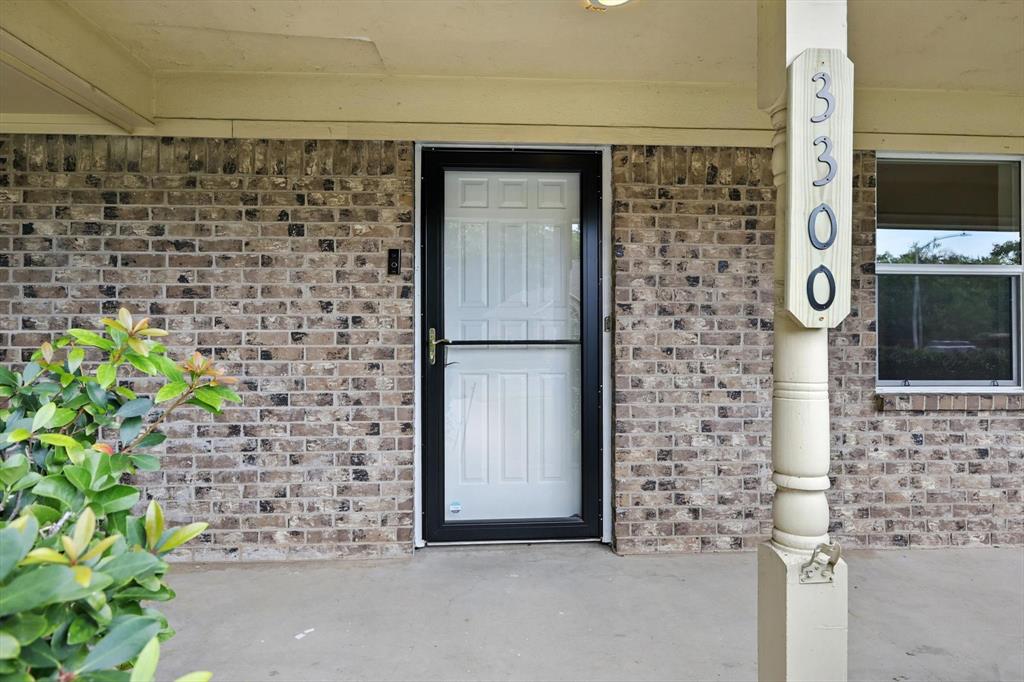 3300 Dunes Street Denton, TX 76209 - Photo 4 of 40 a bathroom with a shower and a sink