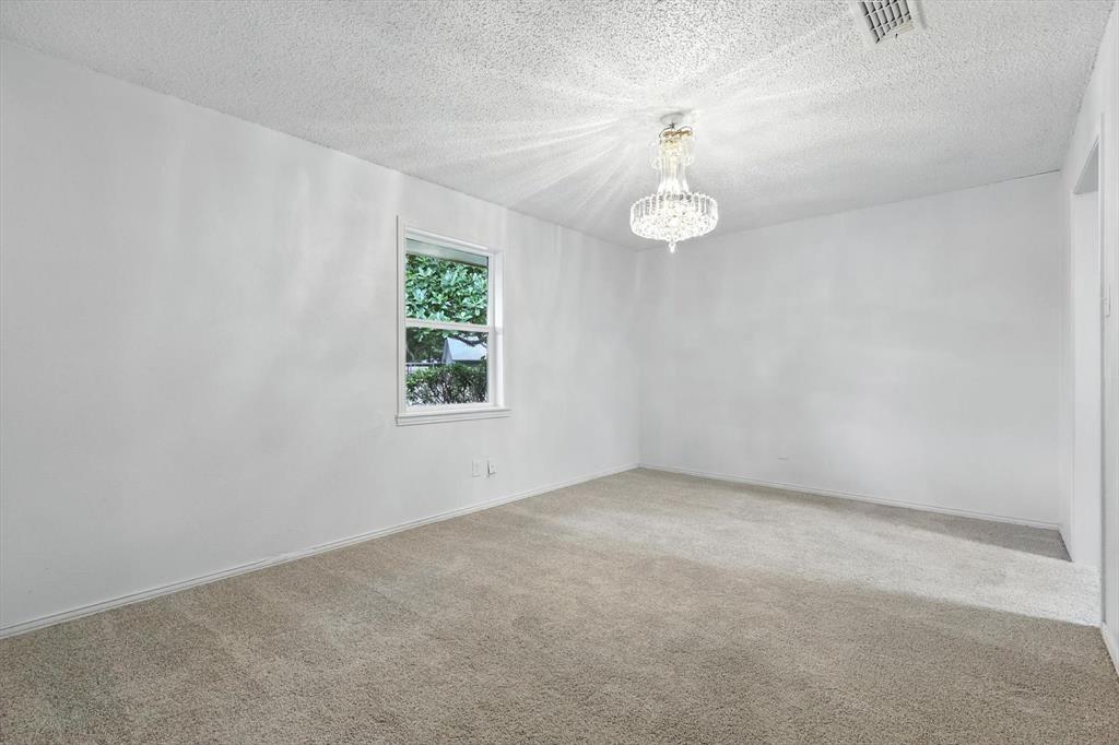 3300 Dunes Street Denton, TX 76209 - Photo 8 of 40 an empty room with windows