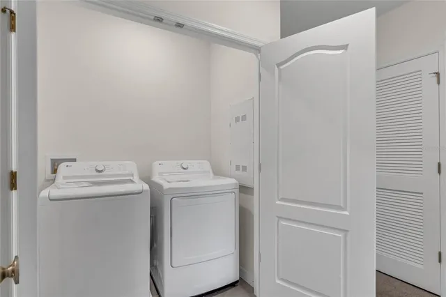 a utility room with dryer and washer