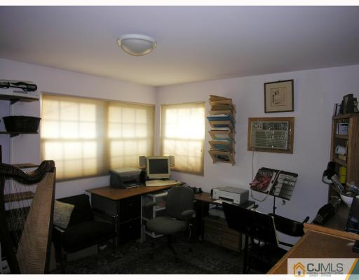 50 Wilcox Road New Brunswick, NJ 08901 - Photo 7 of 10 a view of a livingroom with furniture and a window