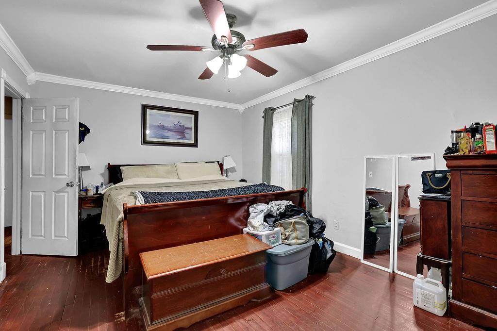 804 Rowland Road Stone Mountain, GA 30083 - Photo 18 of 23 a bed room with a bed and a tv