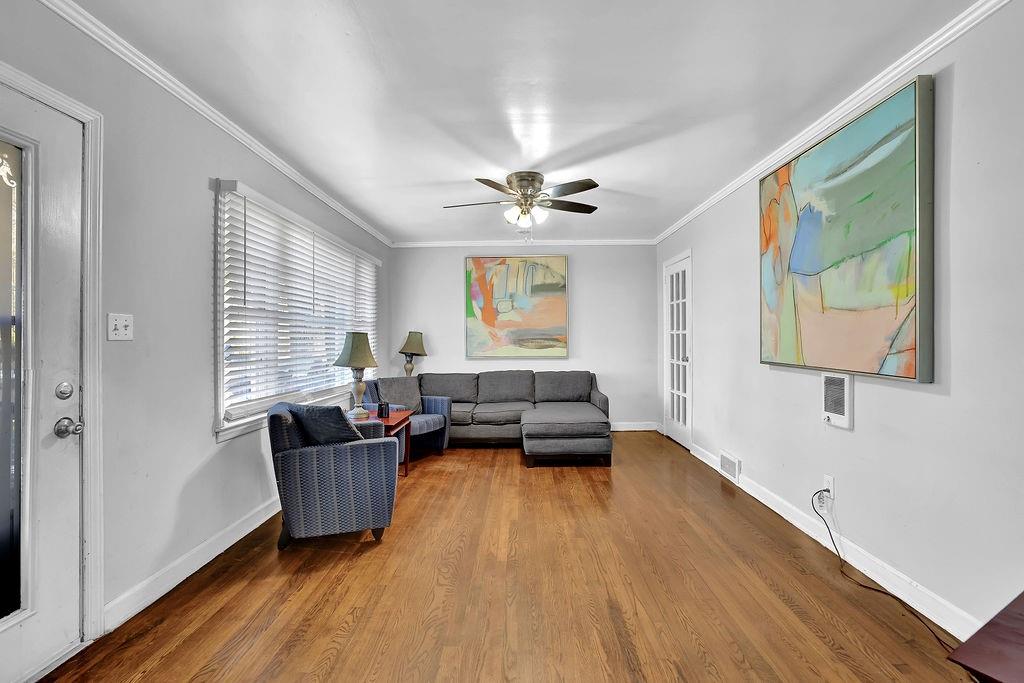 804 Rowland Road Stone Mountain, GA 30083 - Photo 6 of 23 a living room with furniture and a large window