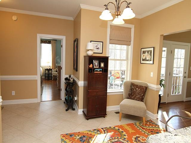 11618 John Allen Road Raleigh, NC 27614 - Photo 9 of 25 This room is open to the LR and kitchen, neutral tile floor to match any décor, crown molding, and can also be used as a sitting area as current owners as doing. Breakfast Area