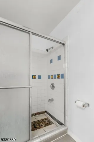 a view of a balcony with wooden floor