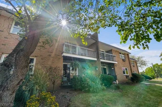 front view of a house with a street