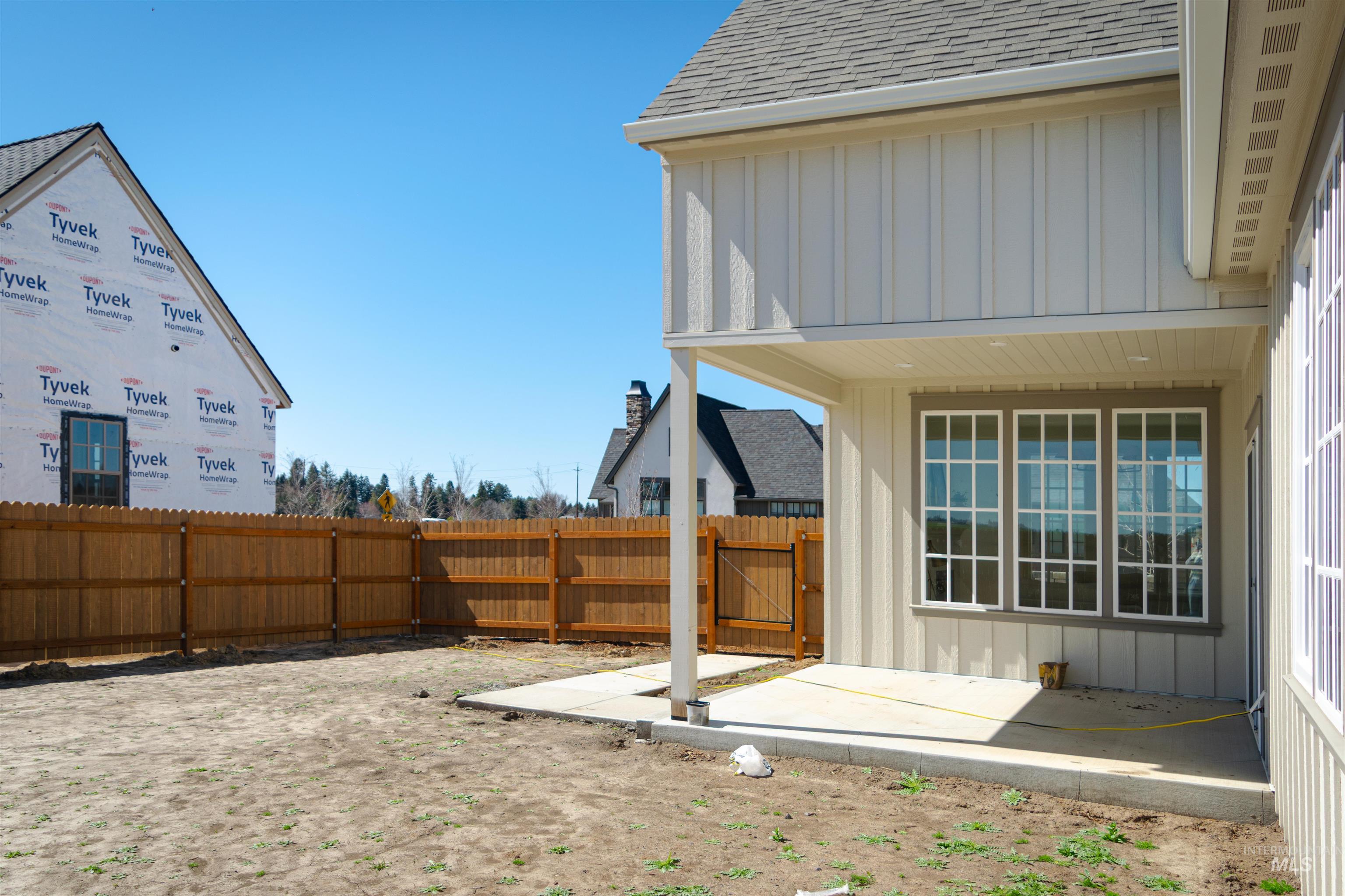 1560 Slonaker, Unit ONYX Moscow, ID 83843 - Photo 24 of 45 Fenced backyard featuring a patio area and a gate