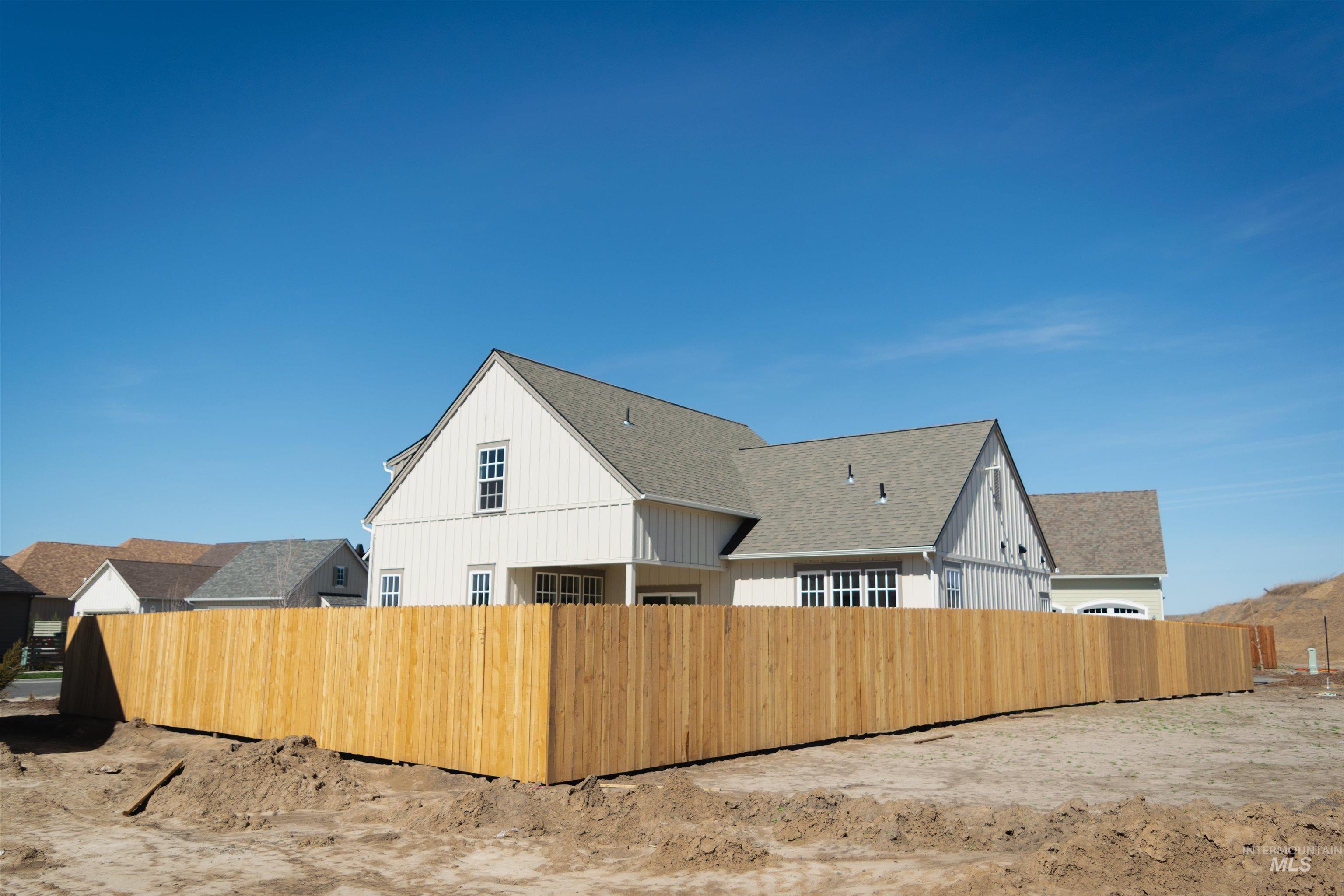 1560 Slonaker, Unit ONYX Moscow, ID 83843 - Photo 26 of 45 Rear view of property featuring a shingled roof