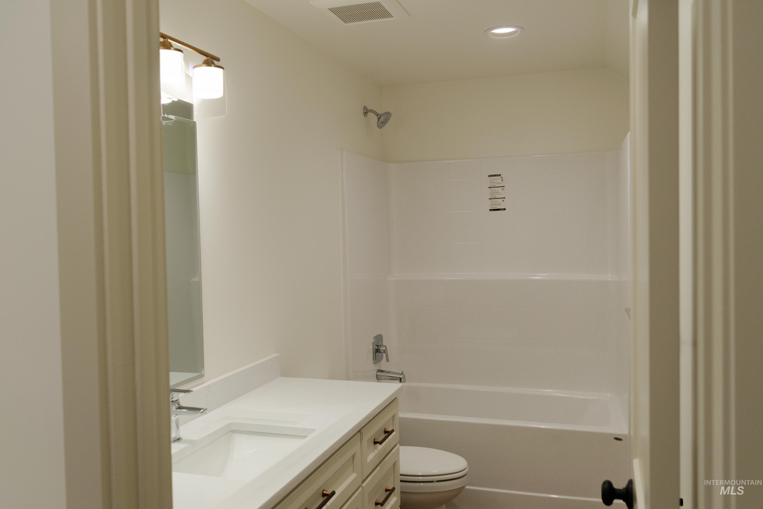1560 Slonaker, Unit ONYX Moscow, ID 83843 - Photo 27 of 49 Full bathroom with vanity, bathing tub / shower combination, and recessed lighting