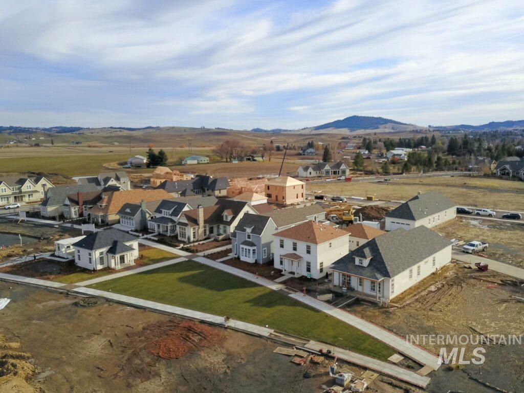 1560 Slonaker, Unit ONYX Moscow, ID 83843 - Photo 33 of 43 Aerial perspective of suburban area with mountains