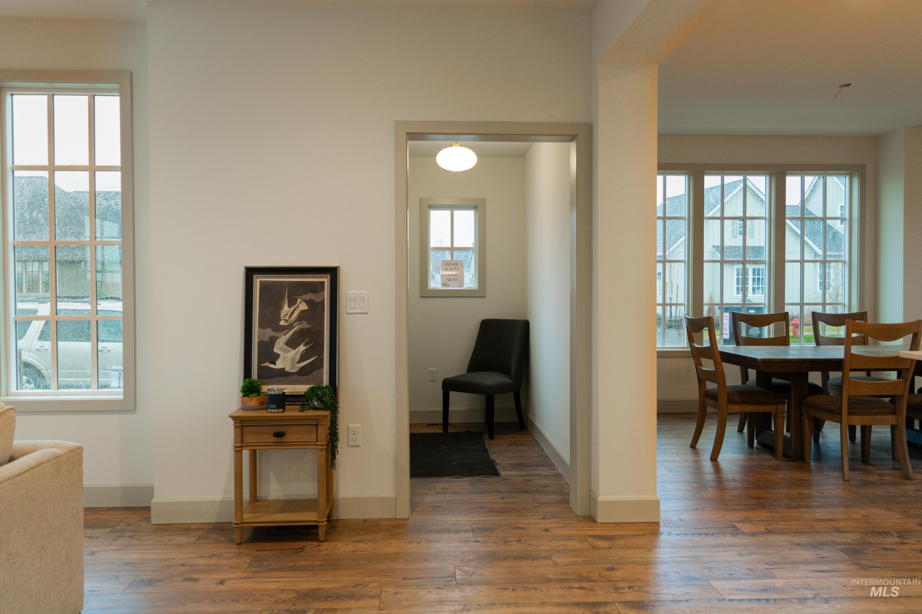 1560 Slonaker, Unit ONYX Moscow, ID 83843 - Photo 8 of 49 Corridor featuring hardwood / wood-style floors and baseboards