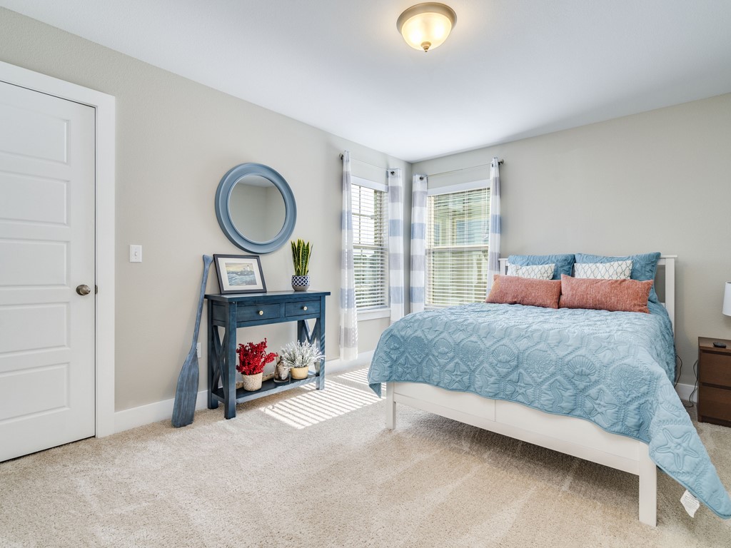 9500 Hunter Lane Austin, TX 78748 - Photo 18 of 25 a bedroom with a bed and a window