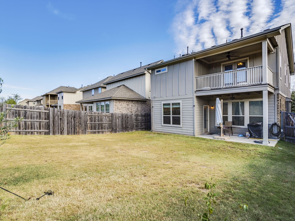 9500 Hunter Lane Austin, TX 78748 - Photo 23 of 25 a yellow house with swimming pool in front of it