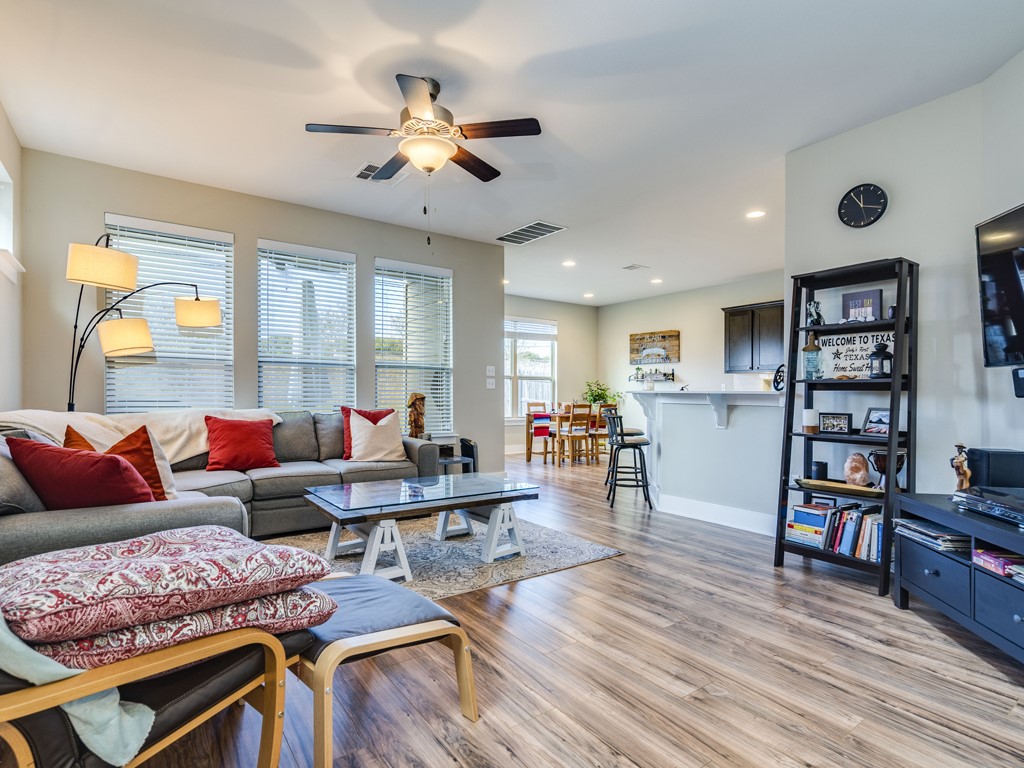 9500 Hunter Lane Austin, TX 78748 - Photo 5 of 25 a living room with furniture and a wooden floor