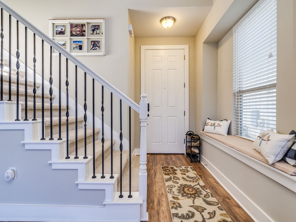 9500 Hunter Lane Austin, TX 78748 - Photo 6 of 25 a view of a hallway with windows and stairs