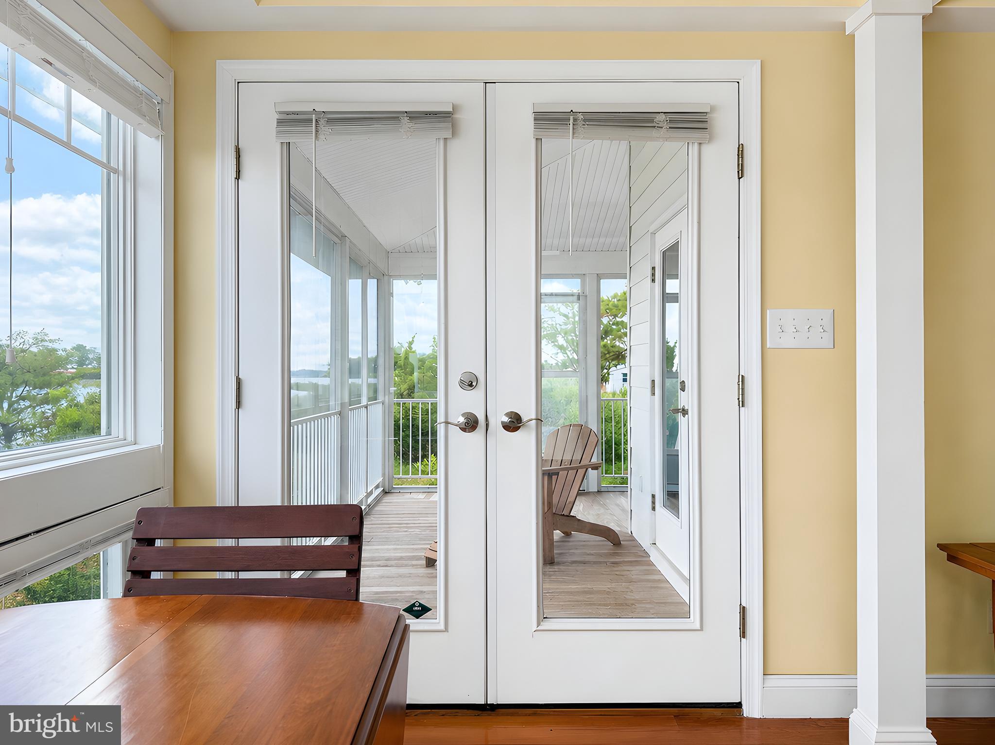 16144 Thomas Road Piney Point, MD 20674 - Photo 12 of 98 Access to Large Wrap-Around Screened Porch