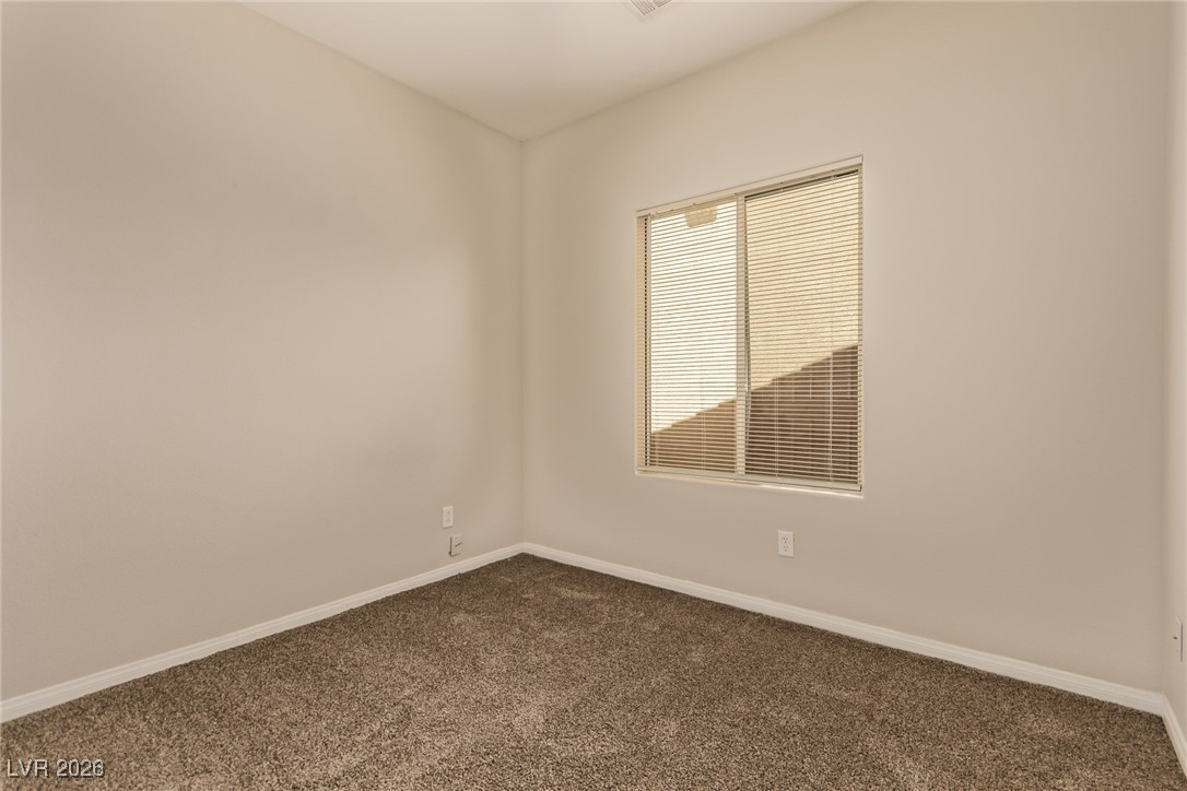 6224 Boulder Rise Street North Las Vegas, NV 89115 - Photo 20 of 27 Unfurnished room with baseboards and carpet flooring