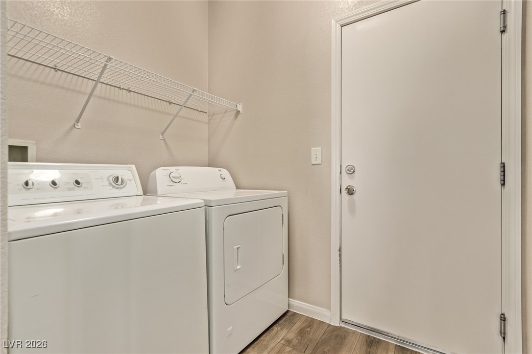 6224 Boulder Rise Street North Las Vegas, NV 89115 - Photo 23 of 27 Washroom with independent washer and dryer and light wood finished floors